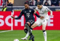 1761477236764-kevin-diks-michael-olise-borussia-moenchengladbach-vs-bayern-munich-bundesliga-liga-jerman-1761432380623_169