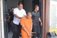 1762427679808-tersangka-saat-digelandang-aparat-polres-tasikmalaya-kota-1762420787883_169