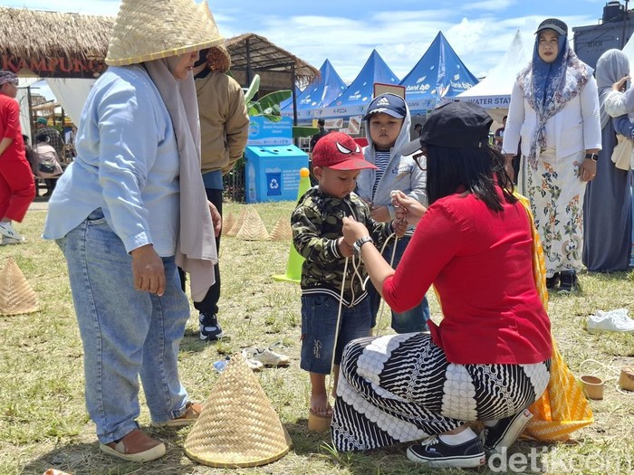 1763270085709-permainan-kelom-batok-bambu-1763199136326_43