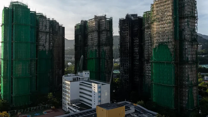 1764500671714-penampakan-apartemen-wang-fuk-court-di-hong-kong-setelah-terbakarap-via-the-sydney-morning-herald-1764315569113_169