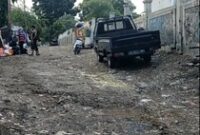 1764630270535-jalan-karet-pasar-baru-barat-tak-kunjung-diaspal-1764549503911_43