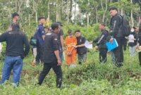 1764824697595-proses-reka-adegan-kasus-penyerangan-seorang-pemuda-di-panawangan-ciamis-yang-melukai-4-orang-hingga-mengakibatkan-satu-orang--1764748675359_169