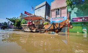 1764997482534-banjir-di-dayeuhkolot-bandung-1764905193576_169