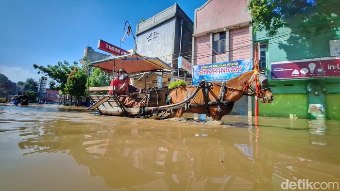 1764997490843-banjir-di-dayeuhkolot-bandung-1764905193576_169