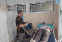 1765451057183-warga-melakukan-usg-cek-kondisi-kesehatan-1765419721091_169