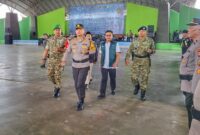 1766163859828-kapolresta-bandung-kombes-aldi-subartono-saat-melakukan-pengecekan-pasukan-di-dome-balerame-soreang-kabupaten-bandung-jumat-19-1766137208538_169