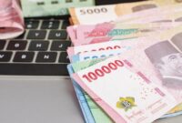 1767027860363-ilustrasi-uang_169